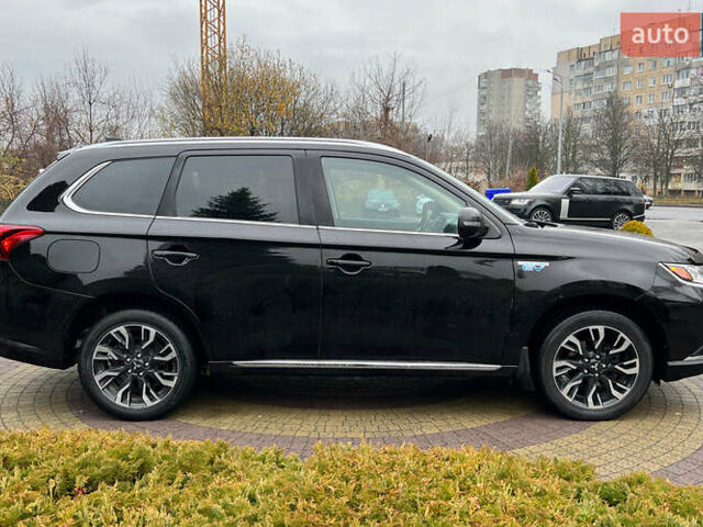 Черный Мицубиси Аутлендер, объемом двигателя 2 л и пробегом 96 тыс. км за 22750 $, фото 7 на Automoto.ua