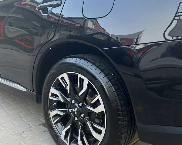 Чорний Міцубісі Аутлендер, об'ємом двигуна 2 л та пробігом 155 тис. км за 22500 $, фото 6 на Automoto.ua