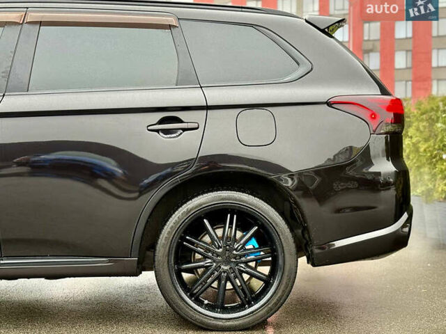 Чорний Міцубісі Аутлендер, об'ємом двигуна 2 л та пробігом 79 тис. км за 22900 $, фото 10 на Automoto.ua