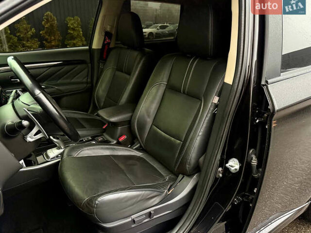 Чорний Міцубісі Аутлендер, об'ємом двигуна 2 л та пробігом 79 тис. км за 22900 $, фото 24 на Automoto.ua