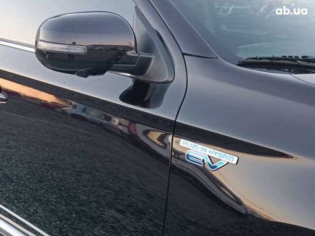 Черный Мицубиси Аутлендер, объемом двигателя 2 л и пробегом 115 тыс. км за 23700 $, фото 12 на Automoto.ua