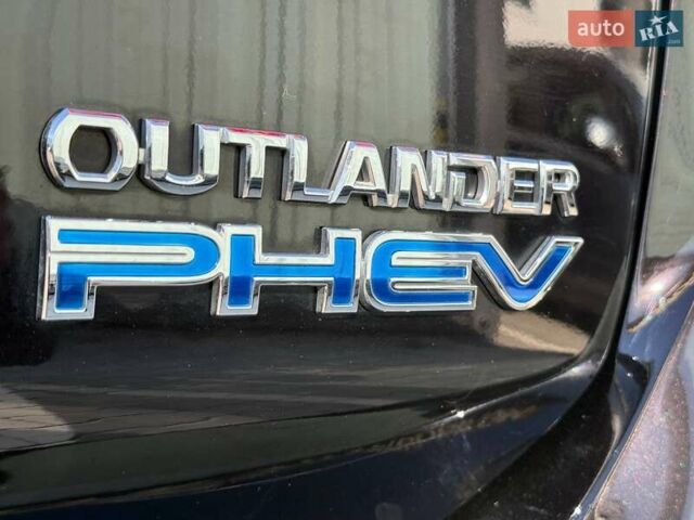 Черный Мицубиси Аутлендер, объемом двигателя 2 л и пробегом 67 тыс. км за 23000 $, фото 16 на Automoto.ua