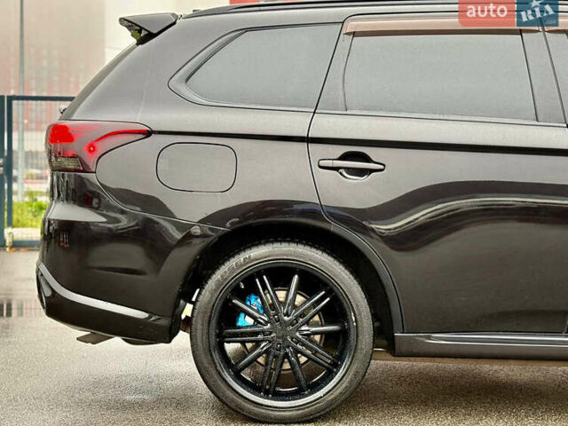 Чорний Міцубісі Аутлендер, об'ємом двигуна 2 л та пробігом 79 тис. км за 22900 $, фото 12 на Automoto.ua