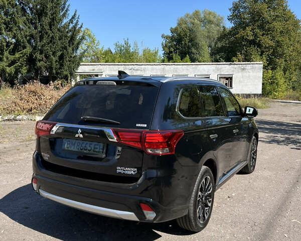 Черный Мицубиси Аутлендер, объемом двигателя 2 л и пробегом 54 тыс. км за 21500 $, фото 4 на Automoto.ua