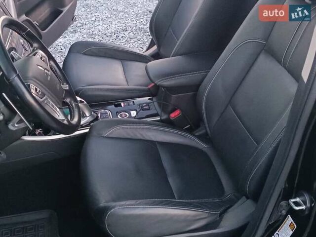 Чорний Міцубісі Аутлендер, об'ємом двигуна 2 л та пробігом 115 тис. км за 23700 $, фото 27 на Automoto.ua