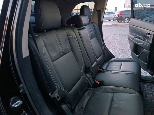 Черный Мицубиси Аутлендер, объемом двигателя 2 л и пробегом 115 тыс. км за 23700 $, фото 35 на Automoto.ua