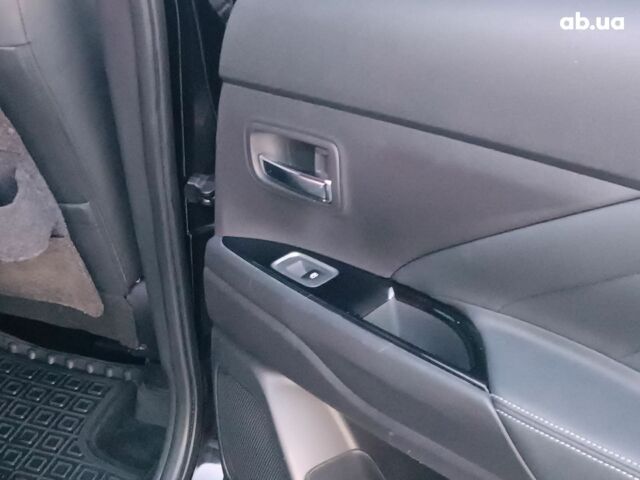 Черный Мицубиси Аутлендер, объемом двигателя 2 л и пробегом 115 тыс. км за 23700 $, фото 34 на Automoto.ua