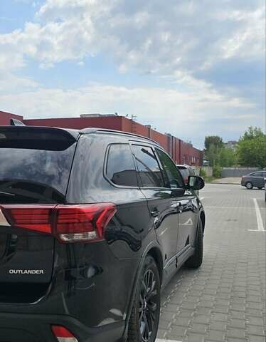 Чорний Міцубісі Аутлендер, об'ємом двигуна 2.4 л та пробігом 81 тис. км за 17100 $, фото 14 на Automoto.ua