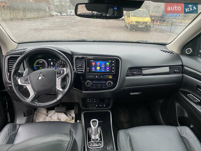 Черный Мицубиси Аутлендер, объемом двигателя 2 л и пробегом 76 тыс. км за 20800 $, фото 6 на Automoto.ua