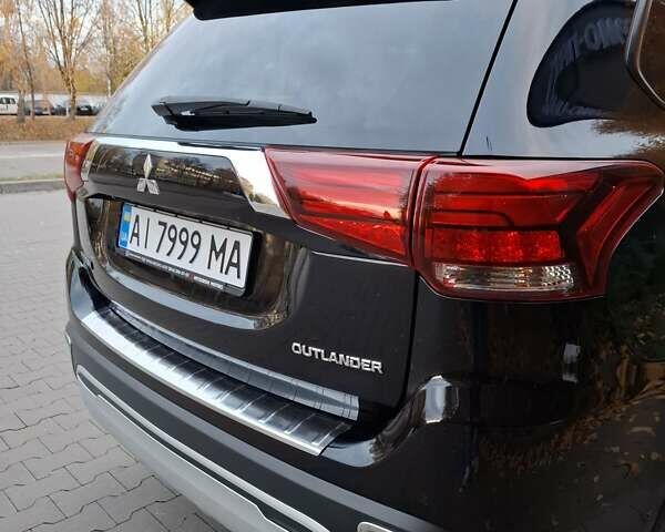 Міцубісі Аутлендер 2018 у Белой Церкве на Automoto.ua Чорний Міцубісі Аутлендер, об'ємом двигуна 2 л та пробігом 121 тис. км за 17800 $, фото 26 на Automoto.ua