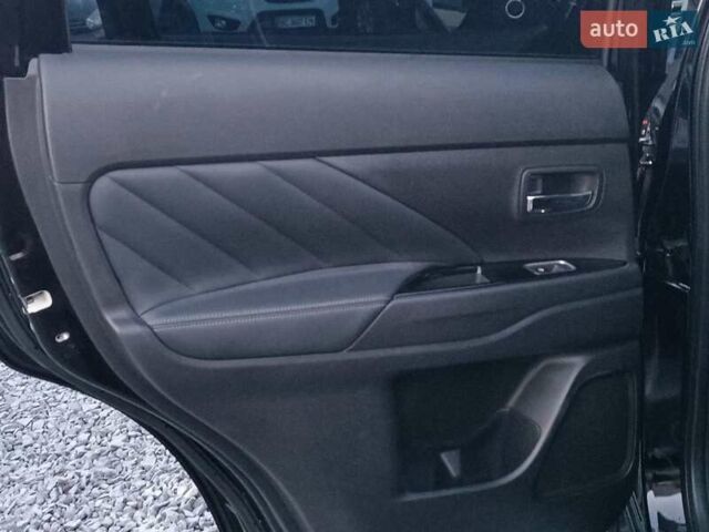 Чорний Міцубісі Аутлендер, об'ємом двигуна 2 л та пробігом 115 тис. км за 23700 $, фото 30 на Automoto.ua