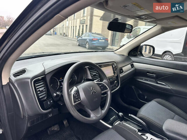 Чорний Міцубісі Аутлендер, об'ємом двигуна 2.36 л та пробігом 169 тис. км за 13450 $, фото 17 на Automoto.ua