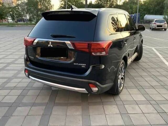 Черный Мицубиси Аутлендер, объемом двигателя 2.4 л и пробегом 75 тыс. км за 13000 $, фото 6 на Automoto.ua