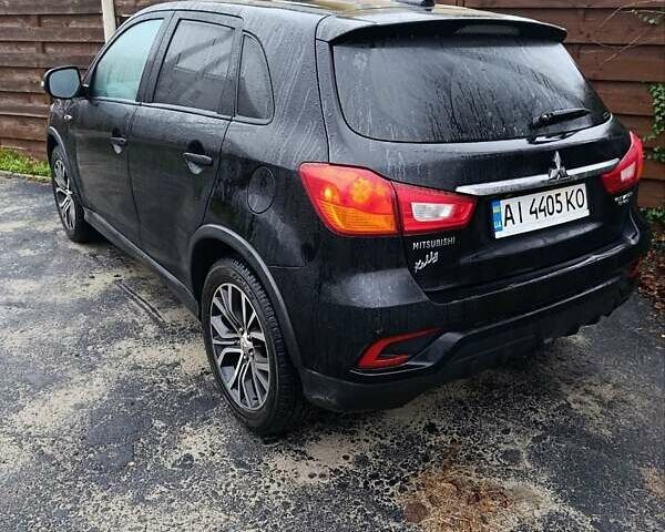 Чорний Міцубісі Аутлендер, об'ємом двигуна 2 л та пробігом 148 тис. км за 13000 $, фото 2 на Automoto.ua