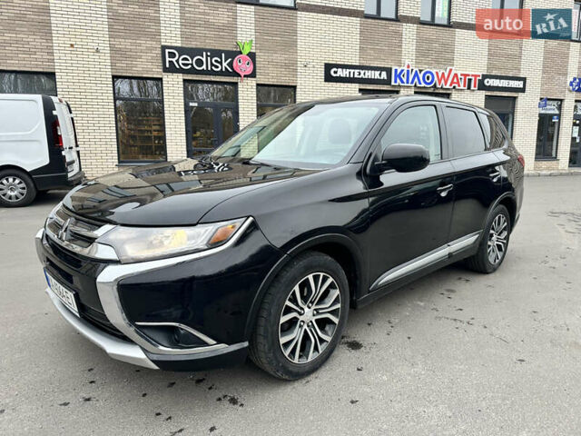 Чорний Міцубісі Аутлендер, об'ємом двигуна 2.36 л та пробігом 169 тис. км за 13450 $, фото 10 на Automoto.ua