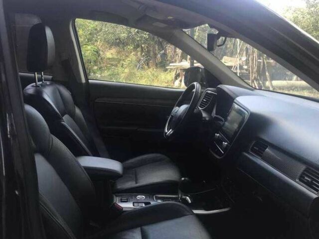 Черный Мицубиси Аутлендер, объемом двигателя 2.4 л и пробегом 125 тыс. км за 11200 $, фото 12 на Automoto.ua