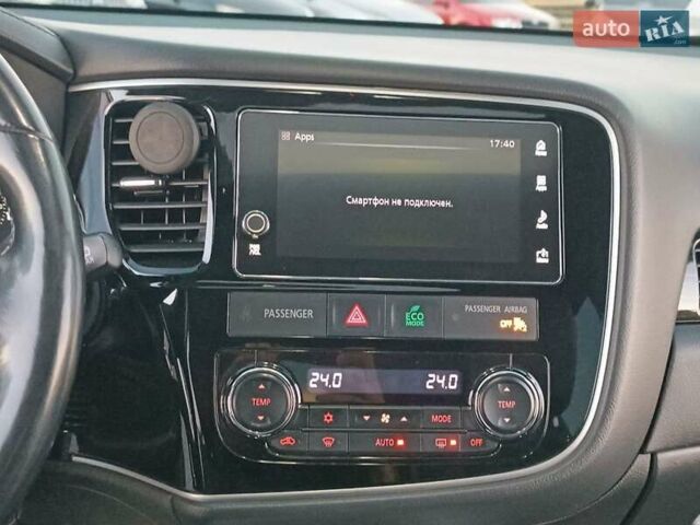 Чорний Міцубісі Аутлендер, об'ємом двигуна 2 л та пробігом 115 тис. км за 23700 $, фото 23 на Automoto.ua