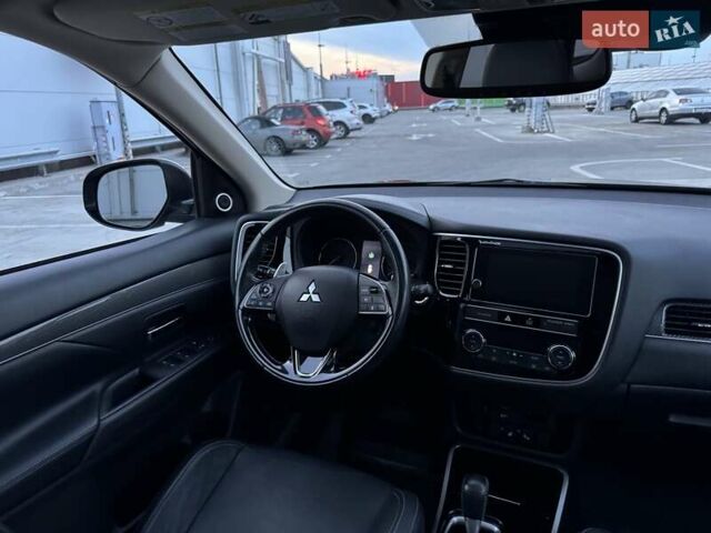 Черный Мицубиси Аутлендер, объемом двигателя 3 л и пробегом 115 тыс. км за 18200 $, фото 25 на Automoto.ua