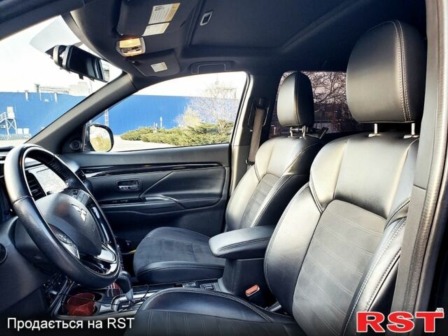 Черный Мицубиси Аутлендер, объемом двигателя 2.4 л и пробегом 130 тыс. км за 16499 $, фото 6 на Automoto.ua