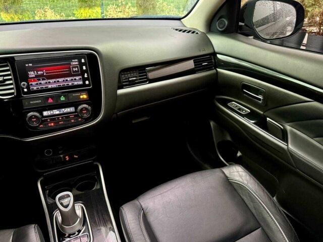 Чорний Міцубісі Аутлендер, об'ємом двигуна 2 л та пробігом 79 тис. км за 22900 $, фото 17 на Automoto.ua