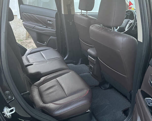 Чорний Міцубісі Аутлендер, об'ємом двигуна 2 л та пробігом 155 тис. км за 22500 $, фото 14 на Automoto.ua