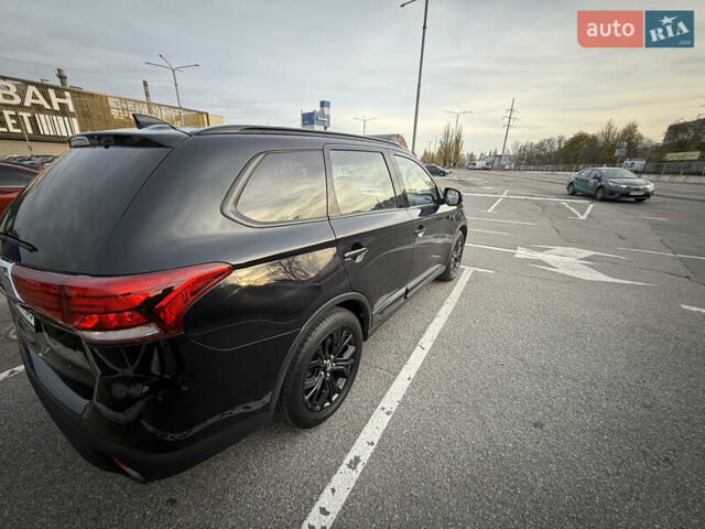 Черный Мицубиси Аутлендер, объемом двигателя 2.36 л и пробегом 153 тыс. км за 14800 $, фото 7 на Automoto.ua