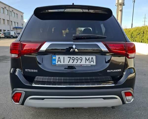 Міцубісі Аутлендер 2018 у Белой Церкве на Automoto.ua Чорний Міцубісі Аутлендер, об'ємом двигуна 2 л та пробігом 121 тис. км за 17800 $, фото 14 на Automoto.ua