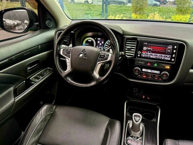 Чорний Міцубісі Аутлендер, об'ємом двигуна 2 л та пробігом 79 тис. км за 22900 $, фото 18 на Automoto.ua