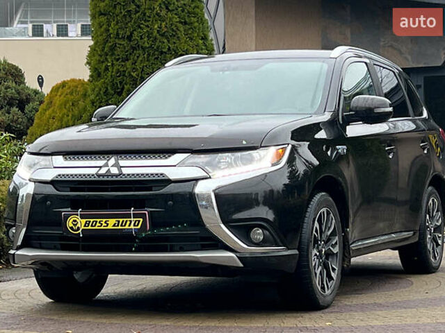 Черный Мицубиси Аутлендер, объемом двигателя 2 л и пробегом 96 тыс. км за 22750 $, фото 2 на Automoto.ua