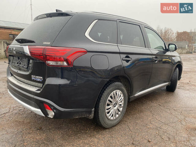 Черный Мицубиси Аутлендер, объемом двигателя 2 л и пробегом 76 тыс. км за 20800 $, фото 2 на Automoto.ua