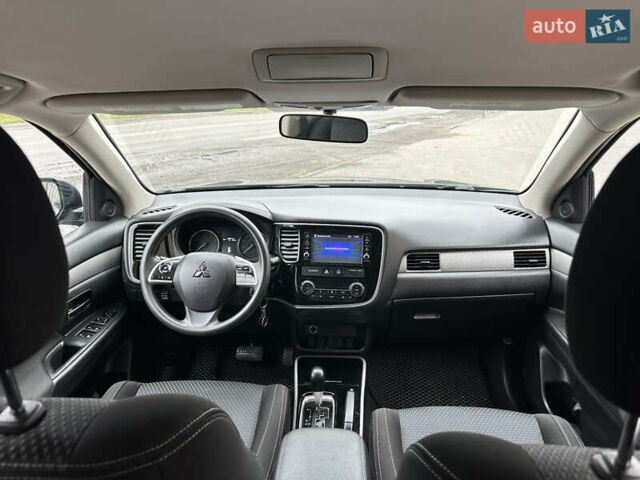 Чорний Міцубісі Аутлендер, об'ємом двигуна 2.36 л та пробігом 169 тис. км за 13450 $, фото 28 на Automoto.ua