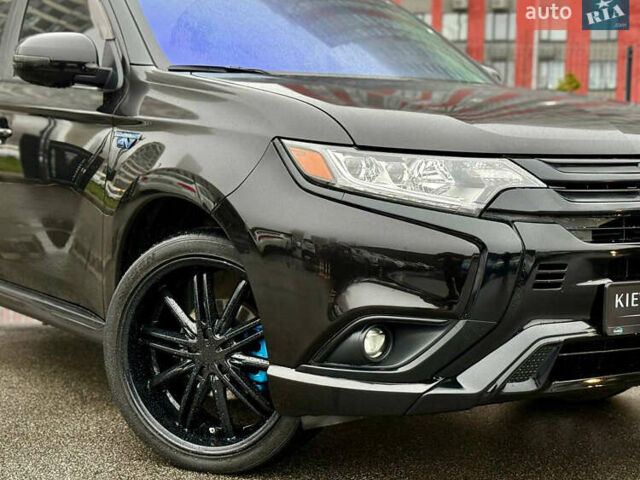Чорний Міцубісі Аутлендер, об'ємом двигуна 2 л та пробігом 79 тис. км за 22900 $, фото 4 на Automoto.ua
