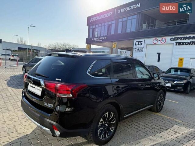 Черный Мицубиси Аутлендер, объемом двигателя 2 л и пробегом 67 тыс. км за 23000 $, фото 4 на Automoto.ua