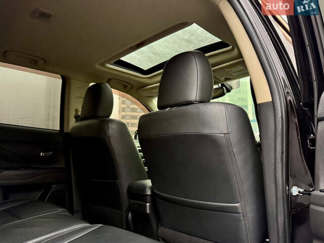 Чорний Міцубісі Аутлендер, об'ємом двигуна 2 л та пробігом 79 тис. км за 22900 $, фото 39 на Automoto.ua