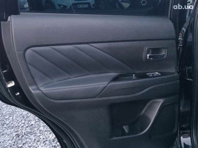 Черный Мицубиси Аутлендер, объемом двигателя 2 л и пробегом 115 тыс. км за 23700 $, фото 30 на Automoto.ua