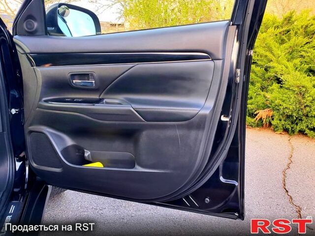 Черный Мицубиси Аутлендер, объемом двигателя 2.4 л и пробегом 130 тыс. км за 16499 $, фото 9 на Automoto.ua