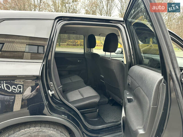 Чорний Міцубісі Аутлендер, об'ємом двигуна 2.36 л та пробігом 169 тис. км за 13450 $, фото 21 на Automoto.ua