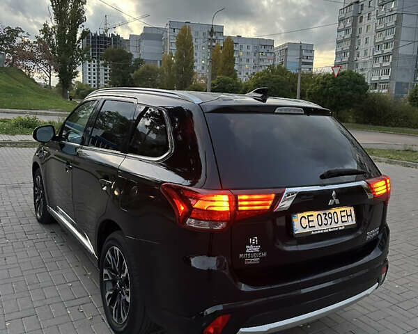 Мицубиси Аутлендер 2018 в Черкассах на Automoto.ua Черный Мицубиси Аутлендер, объемом двигателя 2 л и пробегом 147 тыс. км за 20000 $, фото 3 на Automoto.ua