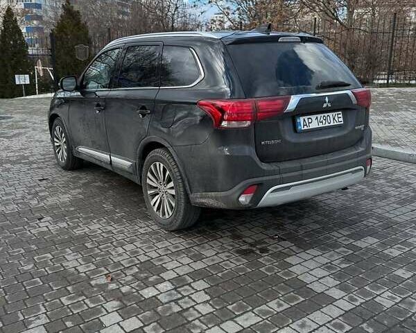 Черный Мицубиси Аутлендер, объемом двигателя 2.36 л и пробегом 91 тыс. км за 18300 $, фото 6 на Automoto.ua