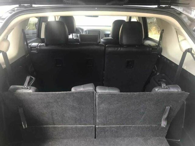 Черный Мицубиси Аутлендер, объемом двигателя 2.4 л и пробегом 125 тыс. км за 11200 $, фото 9 на Automoto.ua