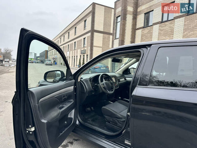 Чорний Міцубісі Аутлендер, об'ємом двигуна 2.36 л та пробігом 169 тис. км за 13450 $, фото 12 на Automoto.ua