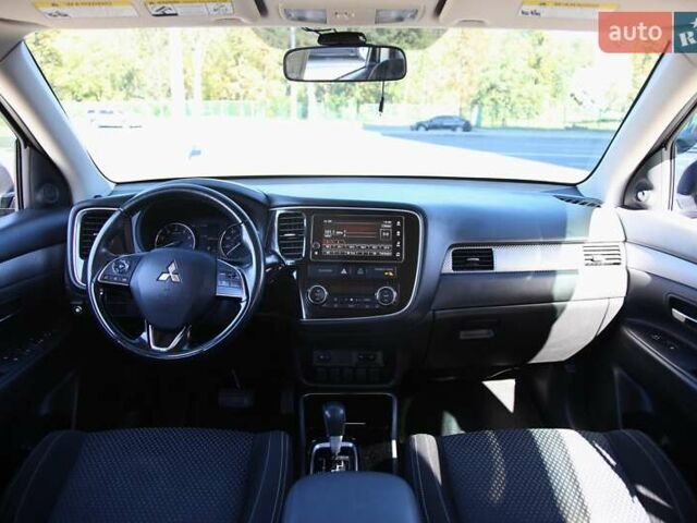 Черный Мицубиси Аутлендер, объемом двигателя 2.4 л и пробегом 130 тыс. км за 16200 $, фото 12 на Automoto.ua