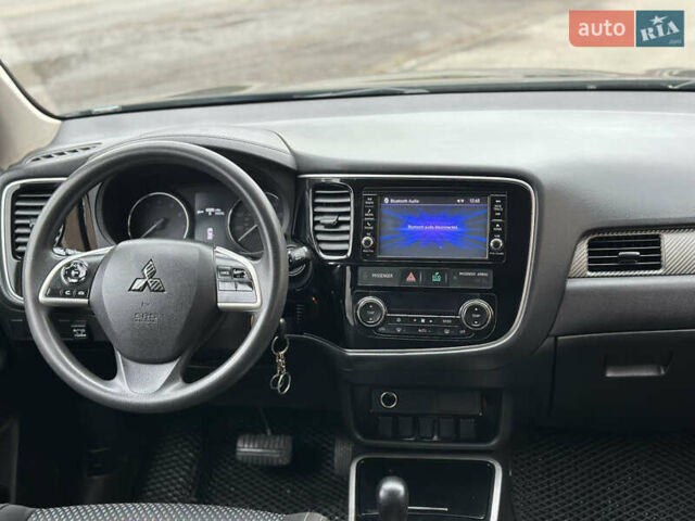 Чорний Міцубісі Аутлендер, об'ємом двигуна 2.36 л та пробігом 169 тис. км за 13450 $, фото 27 на Automoto.ua