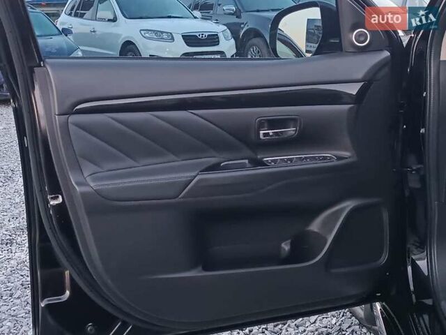 Чорний Міцубісі Аутлендер, об'ємом двигуна 2 л та пробігом 115 тис. км за 23700 $, фото 17 на Automoto.ua