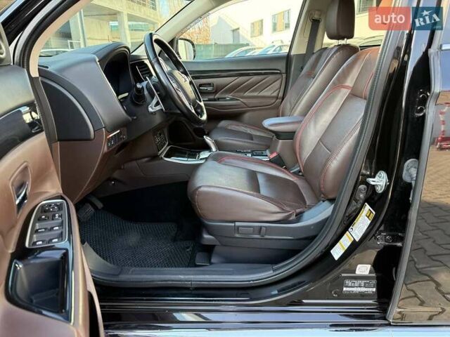 Черный Мицубиси Аутлендер, объемом двигателя 2 л и пробегом 67 тыс. км за 23000 $, фото 18 на Automoto.ua