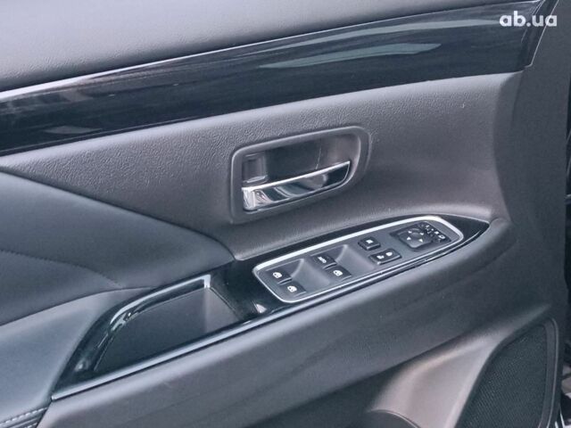 Черный Мицубиси Аутлендер, объемом двигателя 2 л и пробегом 115 тыс. км за 23700 $, фото 18 на Automoto.ua