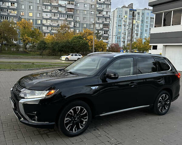 Мицубиси Аутлендер 2018 в Черкассах на Automoto.ua Черный Мицубиси Аутлендер, объемом двигателя 2 л и пробегом 147 тыс. км за 20000 $, фото 1 на Automoto.ua