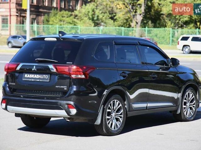 Черный Мицубиси Аутлендер, объемом двигателя 2.4 л и пробегом 130 тыс. км за 16200 $, фото 5 на Automoto.ua