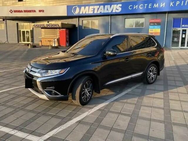 Черный Мицубиси Аутлендер, объемом двигателя 2.4 л и пробегом 75 тыс. км за 13000 $, фото 3 на Automoto.ua