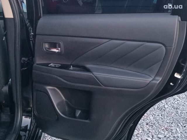 Черный Мицубиси Аутлендер, объемом двигателя 2 л и пробегом 115 тыс. км за 23700 $, фото 33 на Automoto.ua